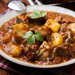 39795012 – beef stew with potatoes in a plate